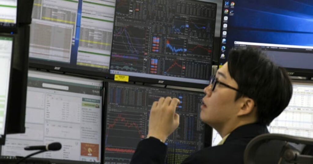 BUSINESS Asian stocks skid, Wall Street and bonds aided by oil slip