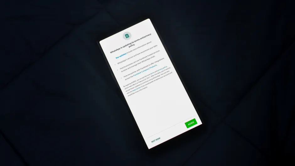 Investor checking shares on the M+ Global app on a smartphone
